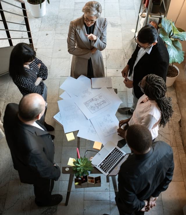 Professional advisers reviewing business documents